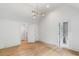 Spacious bedroom with vaulted ceilings, hardwood floors, and access to an ensuite bathroom at 1026 Reeder N Cir, Atlanta, GA 30306