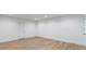 A bedroom with light hardwood floors, recessed lighting, and neutral paint, providing a blank canvas at 1026 Reeder N Cir, Atlanta, GA 30306
