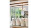 Dining room with natural wood beam ceiling and lots of natural light at 1026 Reeder N Cir, Atlanta, GA 30306
