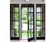 View from inside the house looking to the beautifully landscaped front yard at 1026 Reeder N Cir, Atlanta, GA 30306
