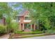 Traditional brick home with manicured landscaping, brick columns and driveway at 1026 Reeder N Cir, Atlanta, GA 30306