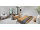 Spacious primary bedroom featuring elegant decor, a large mirror, and natural light at 1026 Reeder N Cir, Atlanta, GA 30306