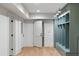 Mudroom with storage, white doors, and light hardwood floors offers functional design at 1026 Reeder N Cir, Atlanta, GA 30306