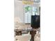 Charming office features a marble desk, large windows, and a contemporary gold chandelier at 1026 Reeder N Cir, Atlanta, GA 30306