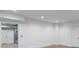 Spacious room with bright walls, featuring a doorway to a mudroom with storage at 1026 Reeder N Cir, Atlanta, GA 30306