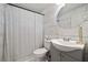 Well-lit bathroom with modern fixtures and stylish decorative shower curtain at 1755 Fairburn Sw Rd, Atlanta, GA 30331