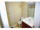 Cozy bathroom features a vanity with a sink, toilet, and mirror at 755 Heritage Valley Rd, Norcross, GA 30093