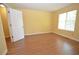 Bedroom featuring natural light, neutral walls and modern laminate floors at 775 Heritage Valley Rd, Norcross, GA 30093