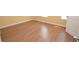 Bedroom featuring neutral paint, trim, laminate flooring and ample natural light at 775 Heritage Valley Rd, Norcross, GA 30093