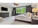 Inviting bedroom features a large window and comfortable carpet perfect for relaxation at 980 Fenimore Cir, Atlanta, GA 30350