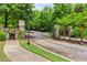 Gated entrance with stone pillars leading to the property at 980 Fenimore Cir, Atlanta, GA 30350