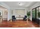 The spacious foyer features hardwood floors and comfortable seating, creating a welcoming atmosphere at 980 Fenimore Cir, Atlanta, GA 30350