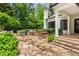 Outdoor kitchen area with stone countertops and built-in grill, ideal for entertaining at 980 Fenimore Cir, Atlanta, GA 30350