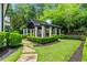 Charming outdoor pavilion with white pillars, perfect for relaxing and entertaining at 980 Fenimore Cir, Atlanta, GA 30350