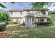 Beautiful backyard featuring a well-manicured lawn and a cozy patio area for outdoor gatherings at 1008 Post Horn Run, Lawrenceville, GA 30045