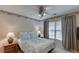 Comfortable bedroom featuring a cozy bed, side tables, and soft lighting at 1008 Post Horn Run, Lawrenceville, GA 30045