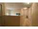 Well-lit hallway with neutral tones and access to multiple rooms at 1008 Post Horn Run, Lawrenceville, GA 30045