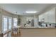 Open kitchen featuring an island, breakfast area and modern appliances at 1008 Post Horn Run, Lawrenceville, GA 30045