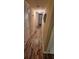 Hallway with warm, rustic flooring and recessed lighting, leading to other rooms in the home at 1638 Raleigh Cir, Marietta, GA 30067