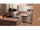 Kitchen with granite countertops and modern appliances at 1638 Raleigh Cir, Marietta, GA 30067