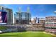 An eye-level outdoor view of the Truist Park stadium featuring the outfield, stands, and the Comcast building in the background at 1638 Raleigh Cir, Marietta, GA 30067