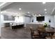 Basement living area with dining table, tv and kitchen area perfect for entertaining guests at 2909 Redding Road Northeast, Atlanta, GA 30319