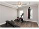 Well-lit exercise room with work out bike, bench, and punching bag, perfect for fitness enthusiasts at 2909 Redding Road Northeast, Atlanta, GA 30319