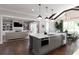 Open-concept kitchen with an island, stainless steel appliances, and hardwood floors at 2909 Redding Road Northeast, Atlanta, GA 30319