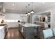 Spacious kitchen with marble island and stainless steel appliances and a view to the living room at 2909 Redding Road Northeast, Atlanta, GA 30319