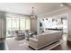 Open-concept living room with hardwood floors and sliding glass doors to the outside at 2909 Redding Road Northeast, Atlanta, GA 30319