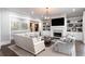 This spacious living room includes a fireplace, built-in shelving, and neutral furniture at 2909 Redding Road Northeast, Atlanta, GA 30319