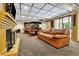 Finished basement with a fireplace, bar and ample seating for entertainment at 3244 Beechwood Se Dr, Marietta, GA 30067