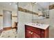 Bathroom featuring vanity with vessel sink and marble tile at 3244 Beechwood Se Dr, Marietta, GA 30067