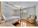 Comfortable bedroom with hardwood floors and a four-poster bed at 3244 Beechwood Se Dr, Marietta, GA 30067