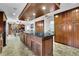 Spacious kitchen with a massive center island, abundant cabinetry, and views to the dining and living areas at 3244 Beechwood Se Dr, Marietta, GA 30067