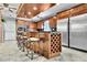 Functional kitchen with an island featuring wine storage, stainless steel appliances, and classic cabinetry at 3244 Beechwood Se Dr, Marietta, GA 30067