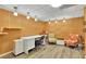 Bright office with desk, chairs, shelves, and laminate flooring at 3244 Beechwood Se Dr, Marietta, GA 30067