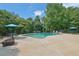 Inviting backyard pool offers a refreshing escape amidst lush greenery at 3244 Beechwood Se Dr, Marietta, GA 30067