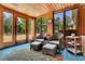 Relaxing porch area featuring seating, a side table, and views of the yard at 3244 Beechwood Se Dr, Marietta, GA 30067