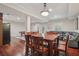 Spacious basement with a dining table, living area, and pool table for entertainment at 4480 Egret Ave, Cumming, GA 30041
