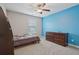 Cozy bedroom with carpet, ceiling fan and large bureau for plenty of storage at 4480 Egret Ave, Cumming, GA 30041