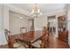 Formal dining room with beautiful chandelier and furniture for Gathering gatherings and special occasions at 4480 Egret Ave, Cumming, GA 30041
