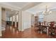 Elegant dining room with wood floors is perfect for entertaining or enjoying Gathering meals at 4480 Egret Ave, Cumming, GA 30041