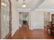 Open foyer with hardwood floors and natural light, offering a glimpse into the living spaces at 4480 Egret Ave, Cumming, GA 30041