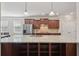 Spacious kitchen with stainless steel appliances, granite countertops, and ample cabinet space at 4480 Egret Ave, Cumming, GA 30041