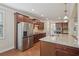 Well-equipped kitchen with stainless steel appliances and granite countertops, perfect for cooking enthusiasts at 4480 Egret Ave, Cumming, GA 30041