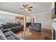 Spacious living room showcasing an open floor plan that connects to the kitchen and dining areas at 4480 Egret Ave, Cumming, GA 30041