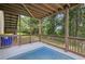 Enjoy the screened-in patio with its comfortable seating and peaceful view of the surrounding landscape at 4480 Egret Ave, Cumming, GA 30041