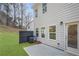 Home's backyard featuring a patio and newly planted sod at 1346 Riverstone Rd # 107, Jonesboro, GA 30238