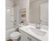 Clean bathroom featuring a shower-tub combination, modern vanity, and neutral tones creating a spa-like ambiance at 1346 Riverstone Rd # 107, Jonesboro, GA 30238